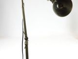 a lamp that is sitting on a table with a white background