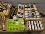 many boxes of electronic equipment sitting on a table