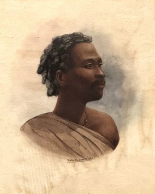 une vieille photo d'un homme avec des dreadlocks sur la tête