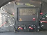 a close up of a car dashboard with various gauges