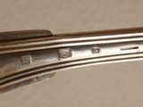 a close up view of a fork and spoon