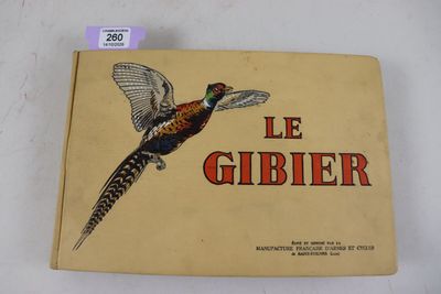 une image représentant un livre sur lequel figure l'illustration d'un faisan en plein vol