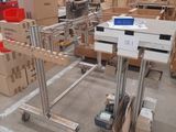 a cart with boxes on it in a warehouse