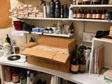 many bottles of alcohol on the shelves in the room