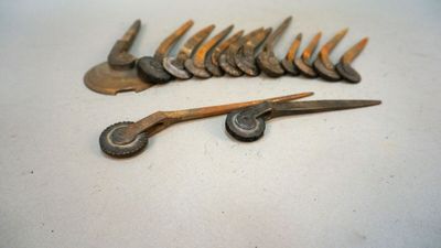 many different types of tools that are sitting on a table
