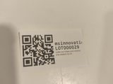 a qr code on the back of a toilet seat
