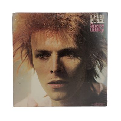 the cover of david bowie ' s album, where he is wearing a mohawk