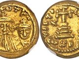 a gold coin with an image of a man and a woman on it