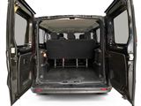 the back of a van with the doors open and the seats folded down