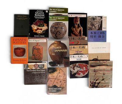 a lot of books that are sitting on a table