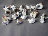a lot of figurines that are sitting on a table