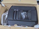 a box with a television inside of it on the floor