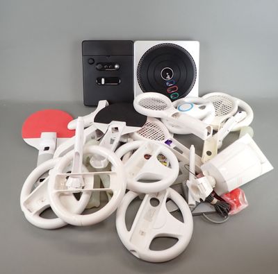 a pile of assorted electronics sitting on a table