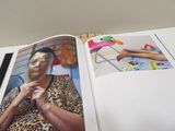 an open book with a picture of a woman in a leopard print dress