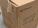 a cardboard box that is sitting on the ground