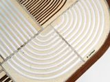 a picture of a close up view of a wooden comb