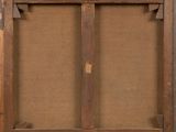an old wooden frame with a brown canvas on it