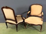 pair of louis xv style armchairs with upholstered arms