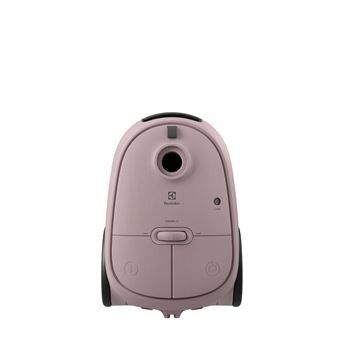 l'aspirateur rose se trouve sur une surface blanche, avec un fond blanc