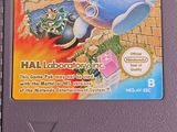 a video game on the table with a sticker on it