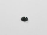 a black diamond on a white surface