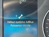 a picture of a car dashboard with a speedometer and gauge