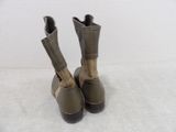 these are two pairs of boots that are on a white surface