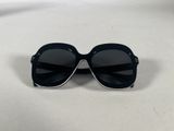 a close up of a pair of sunglasses on a table