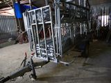 a large metal cage with a bunch of items in it