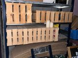 many boxes and boxes on the shelves in the room