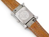 an image of a close up of a watch on a white surface