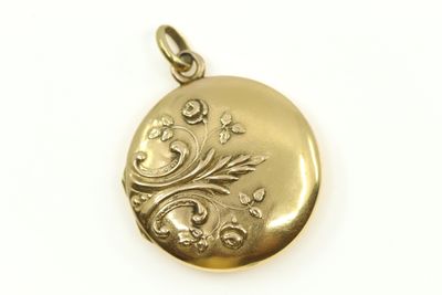 une image représentant un cadenas doré orné d'un motif floral