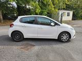 a picture of a white car parked in a parking lot