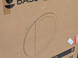 a box that is sitting on the ground next to a chair