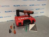 a picture of a red tool box with tools on it