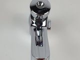 a bathroom sink with a chrome faucet on it