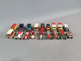 a lot of toy vehicles that are lined up together