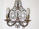 a picture of a wall mounted light fixture on a white wall