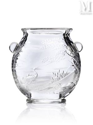 a glass vase with a handle on a white background