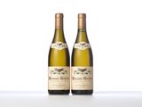 two bottles of wine sitting on top of a white table
