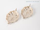 pair of silver plated dishes on a white surface with a white background
