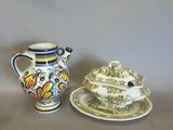 two different types of pottery on the table