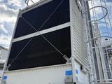 an image of a large metal structure with a sky in the background