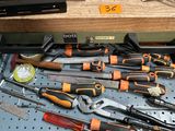 a lot of tools that are sitting on a table