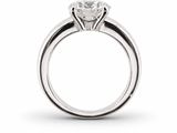 a close up view of a diamond ring on a white background