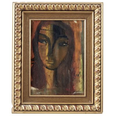 une peinture à l'huile représentant le visage d'une femme, dans un cadre doré