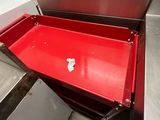 an image of a red metal box in a kitchen