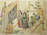 an open book with a picture of a woman in a kimono