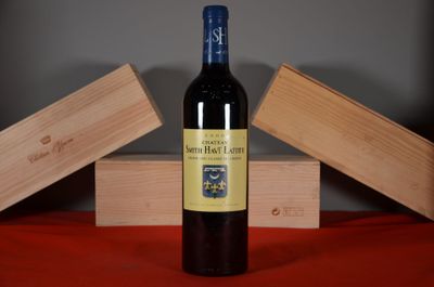 a bottle of wine that is sitting on a table