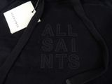 a close up of a black hoodie with a tag on it